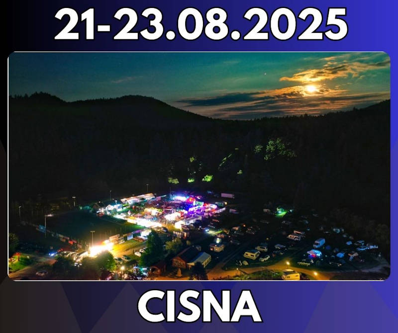 <strong>Festiwal Natchnieni Bieszczadem 2025 </strong><br />Muzyka, poezja i niepowtarzalny klimat Bieszczad<br />21-23.08.2025 - Cisna 12 a city at night with a hill and trees